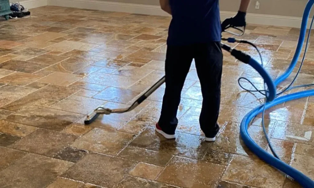 Tile and grout cleaning technician working on a DeBary home
